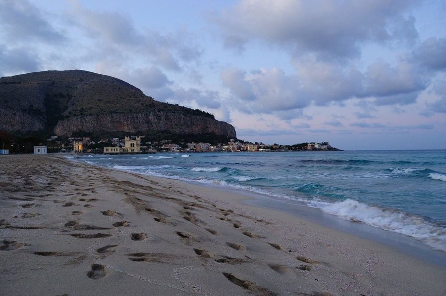 Mondello beach and bay beneath the mountain
