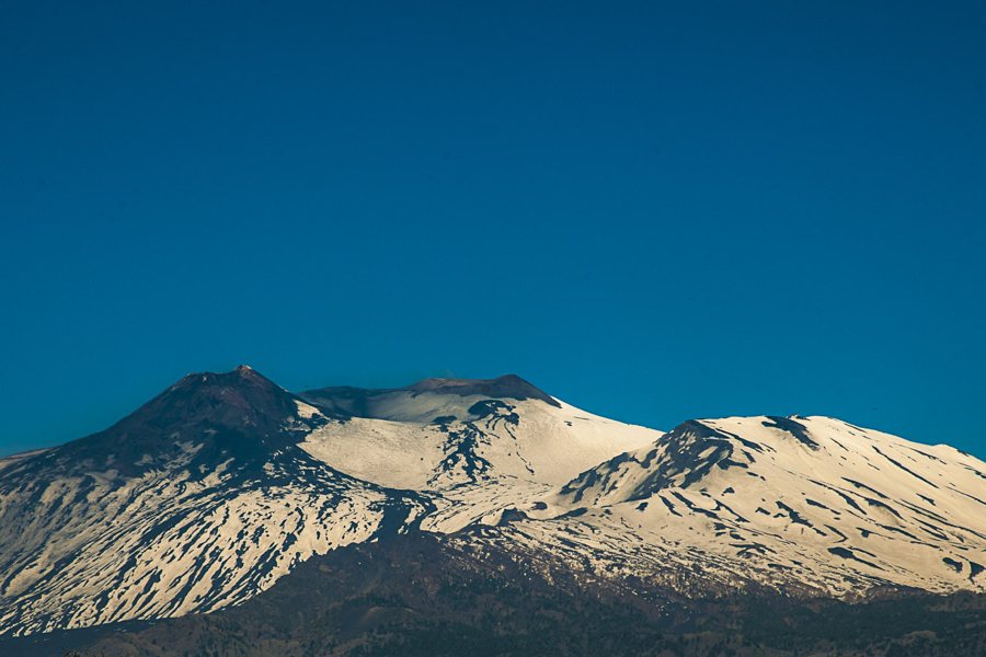 Snow-covered volcanic slopes in Sicily