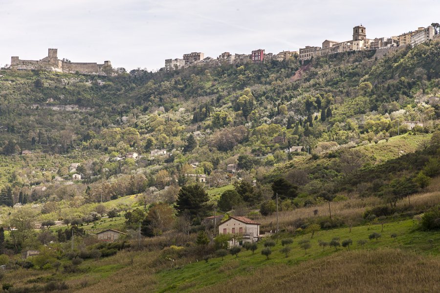 Stone castle above a hillside town in the province of Enna